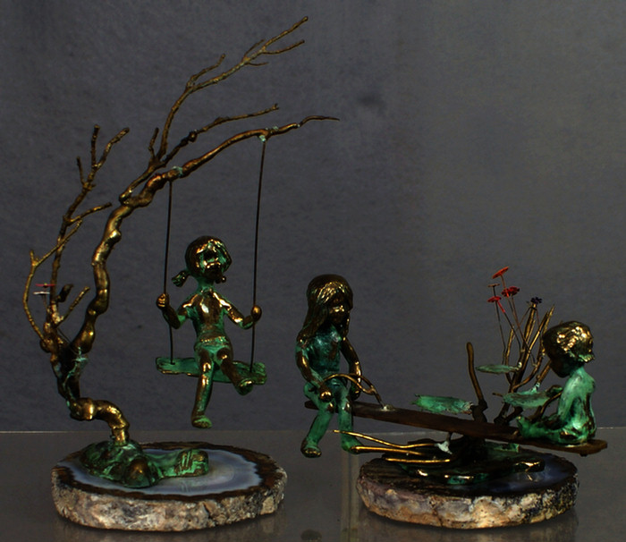 Appraisal: Malcolm Moran American th c bronze figures girl on tree