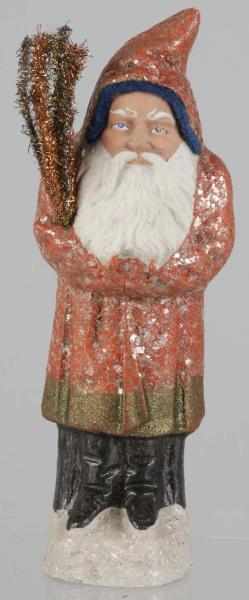 Appraisal: Belsnickel Santa Description Red robe and mica holding tree No