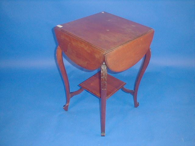 Appraisal: A late Victorian walnut occasional table with folding top carved