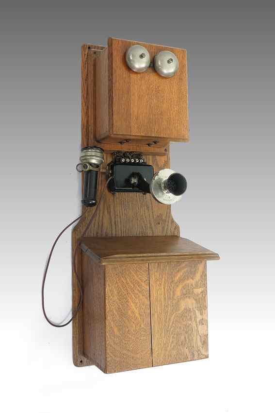 Appraisal: STROMBERG CARLSON OAK DOUBLE BOX WALL PHONE Cranks and bells