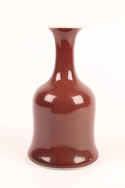 Appraisal: A CHINESE COPPER RED GLAZED MALLET SHAPED VASE with four