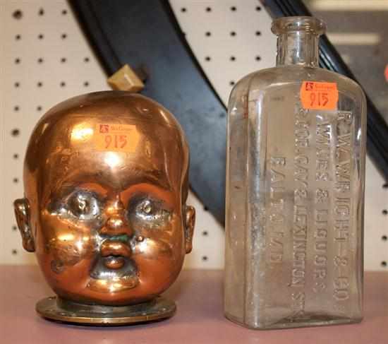 Appraisal: Copper and brass baby's head and an early Baltimore molded