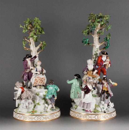 Appraisal: Pair of Meissen painted porcelain floral laden figural groups late