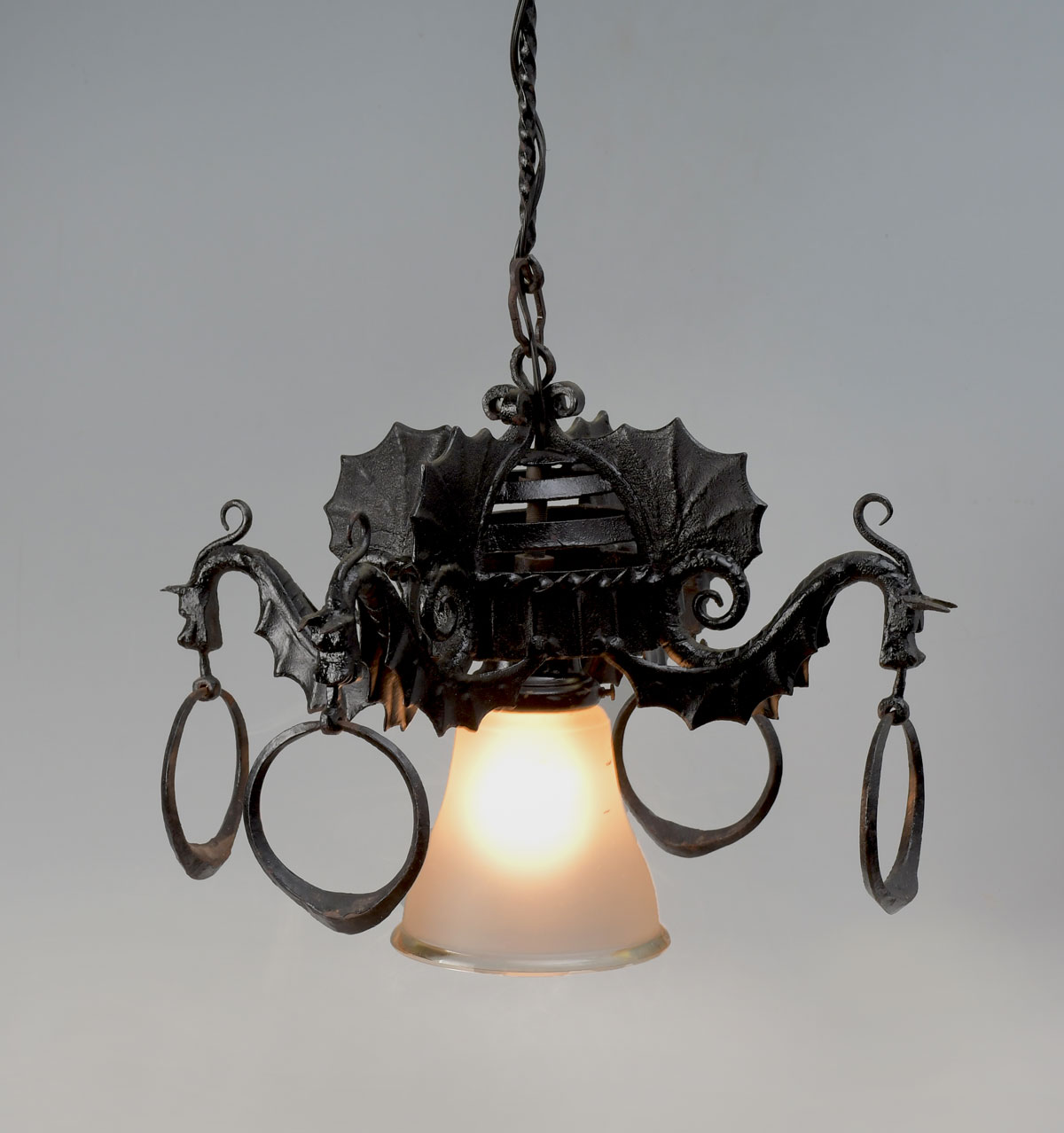 Appraisal: METAL DRAGON MOTIF HANGING LIGHT FIXTURE Single light forged iron