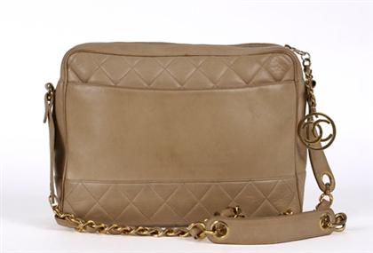 Appraisal: Chanel pale beige leather camera bag With exterior pockets on