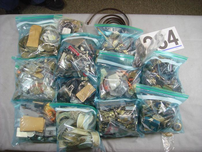 Appraisal: bags of assorted chains springs cables gears brackets case decorations