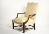 Appraisal: LOLLING CHAIR - Circa - custom mahogany open arm upholstered