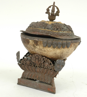 Appraisal: A BRASS AND SILVER MOUNTED MONKEY SKULL LIDDED COMPORT