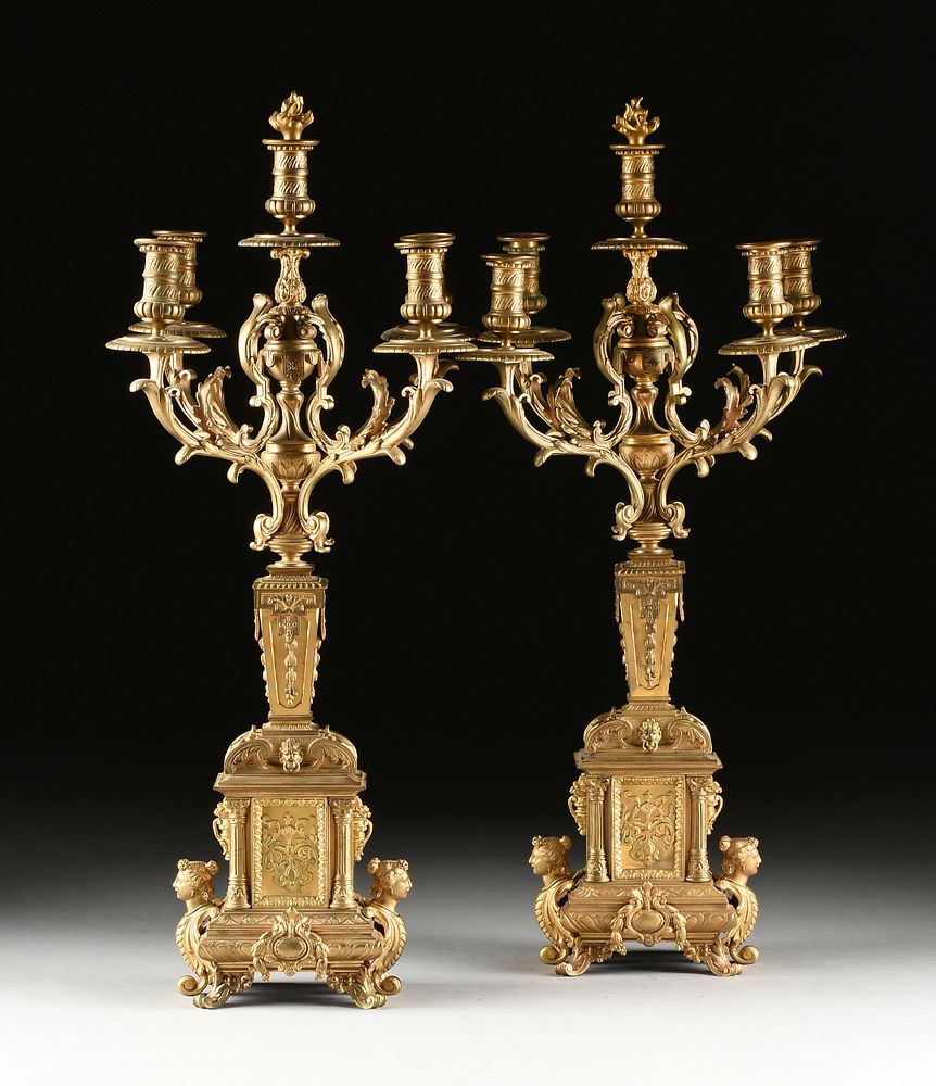 Appraisal: A PAIR OF RENAISSANCE REVIVAL GILT BRONZE FIVE LIGHT CANDELABRAS