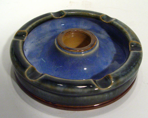 Appraisal: Royal Doulton stoneware ashtray with match striker centre and blue