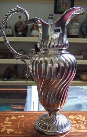 Appraisal: A large plated ewer with spiral fluted decoration to the