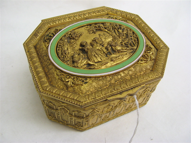 Appraisal: FRENCH GILT METAL DRESSER BOX with repousse decoration hinged lid