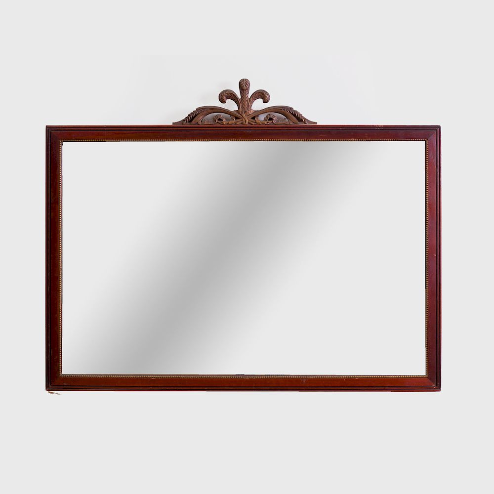 Appraisal: Continental Mahogany and Parcel-Gilt Overmantle Mirror Surmounted by a plume