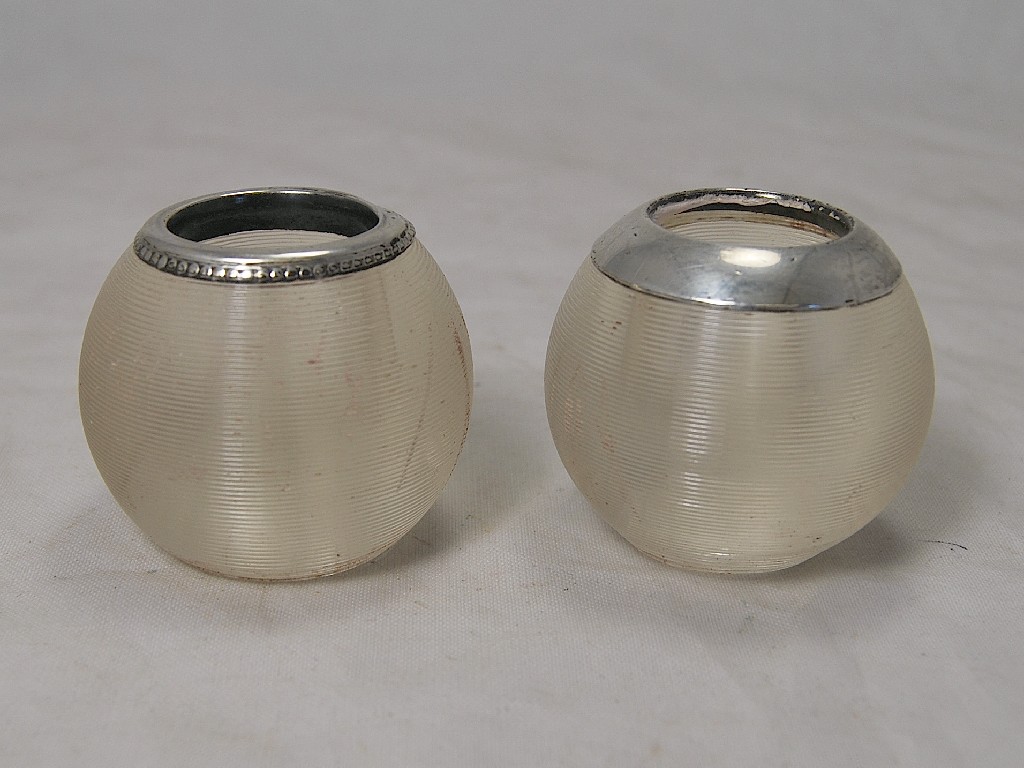 Appraisal: Two reeded glass match strikers with silver rims one London