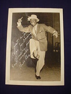 Appraisal: Sepia photograph inscribed and signed by Bill Bojangles Robinson -