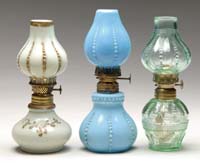 Appraisal: THREE MINI LAMPS S - Blue milk glass with embossed