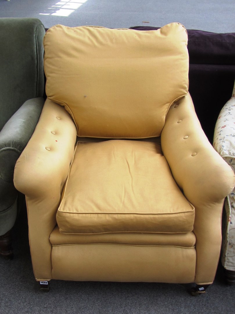 Appraisal: A late Victorian armchair with gold yellow upholstered back and