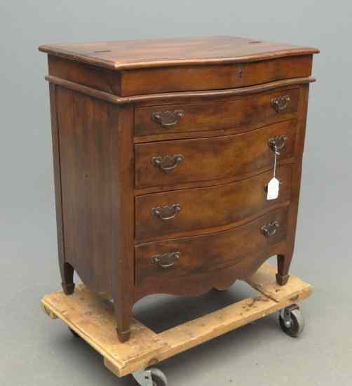 Appraisal: Bachelor style chest with lift top slide out desk section