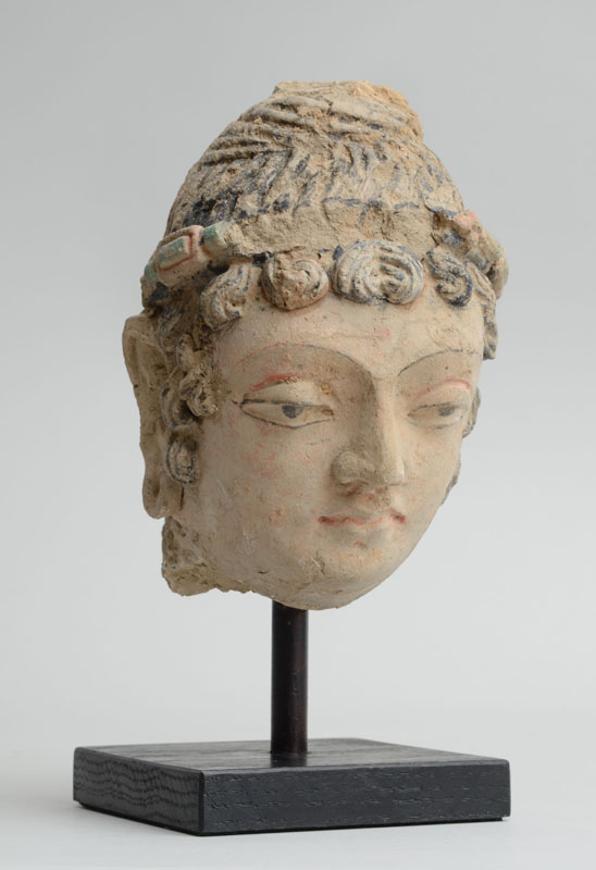 Appraisal: GANDHARAN POLYCHROME CLAY HEAD OF A PRINCE Possibly th- th