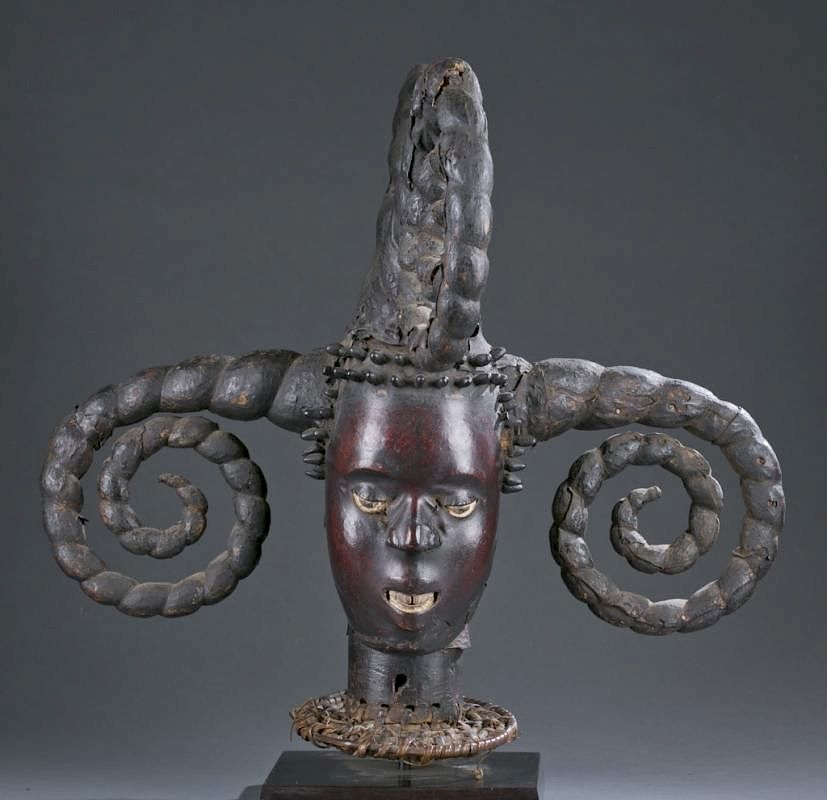 Appraisal: Skin covered headdress with five curled horns A skin covered