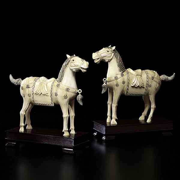 Appraisal: Chinese Ivory Horses Chinese A pair of carved and inked