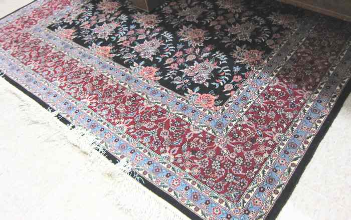 Appraisal: HAND KNOTTED WOOL AND SILK AREA RUG Sino-Persian overall color