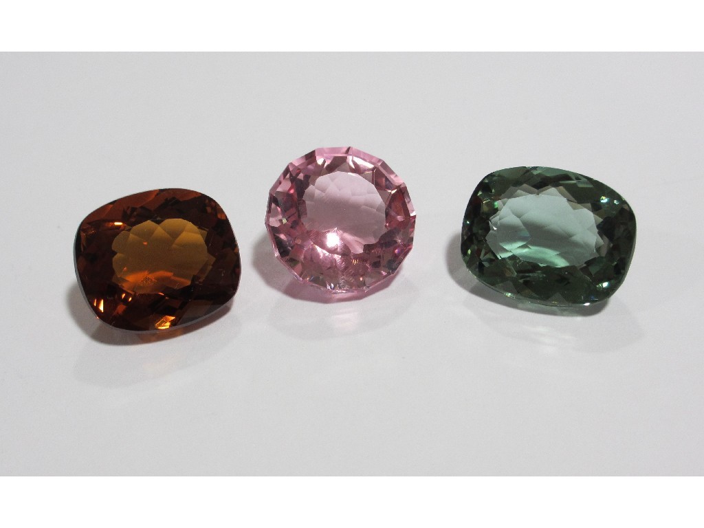 Appraisal: Lot comprising three loose gem stones - pink kunzite ct