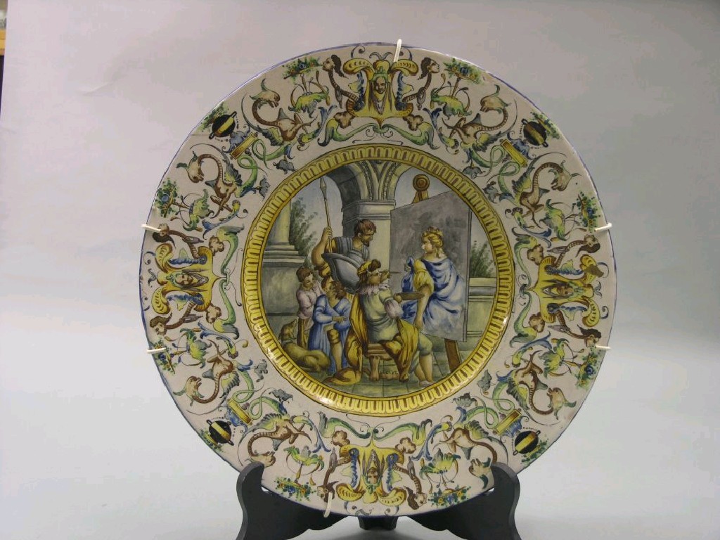 Appraisal: A pair of Italian Majolica wall plates painted with Roman