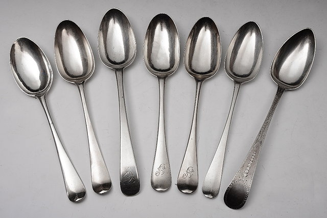 Appraisal: A COLLECTION OF SEVEN VARYING SILVER TABLESPOONS varying in dates