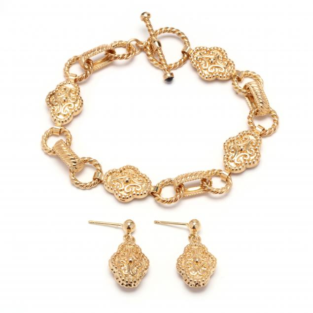 Appraisal: Gold Bracelet and Earrings The bracelet comprised of quatrefoil bar