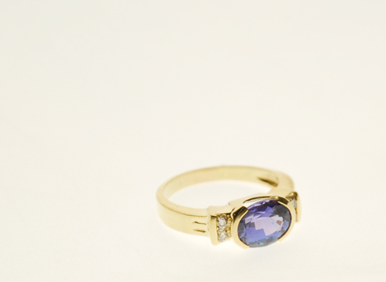 Appraisal: A Gold Tanzanite and Diamond Ring K marked yellow gold