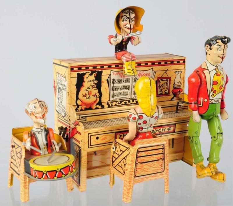 Appraisal: Tin Litho Unique Art L'il Abner Band Wind-Up Toy American