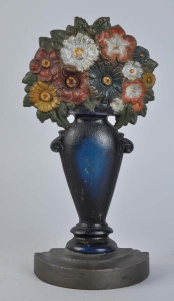 Appraisal: Cast Iron Mixed Flowers Doorstop Made by Bradley and Hubbard