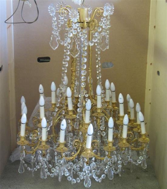 Appraisal: th Century style gilt metal cut glass thirty branch chandelier