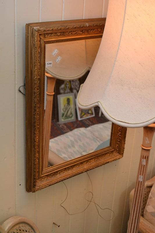 Appraisal: A RECTANGULAR GILT WALL MIRROR A RECTANGULAR GILT WALL MIRROR