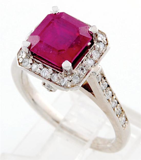 Appraisal: Ruby and diamond cocktail ring square-cut ruby surrounded by carats