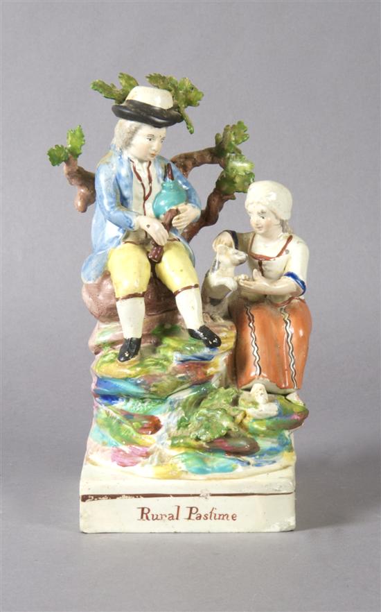 Appraisal: A Staffordshire Figural Group Rural Pastime Height inches