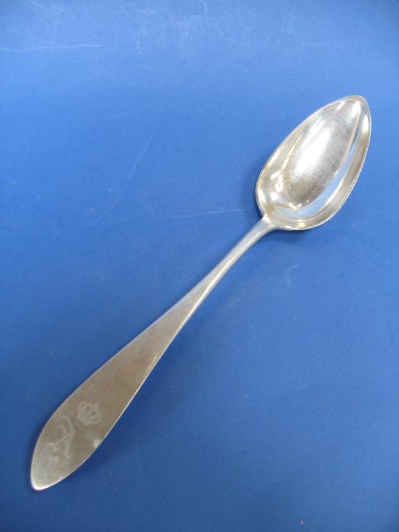 Appraisal: A CONTINENTAL SERVING SPOON of pointed Old English pattern the