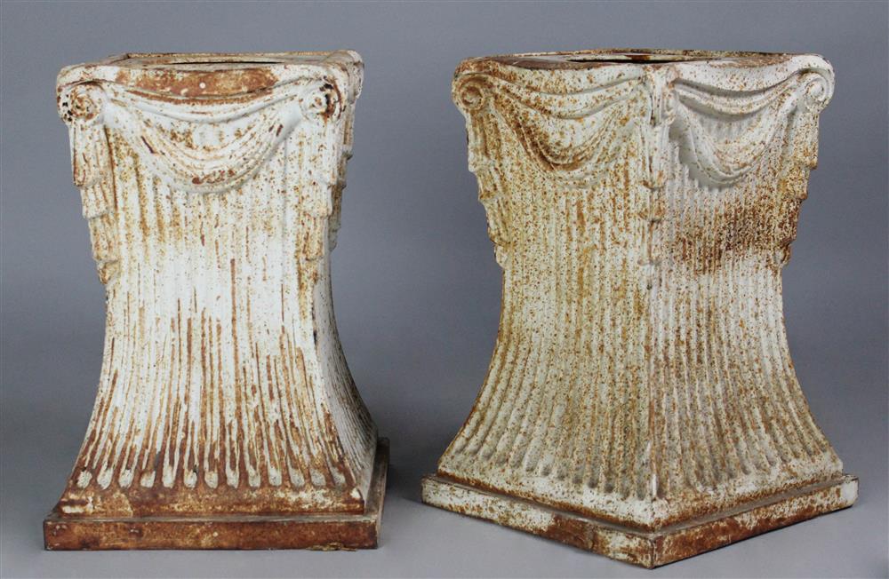 Appraisal: PAIR OF CAST IRON PEDESTALS each cast with drapery swags