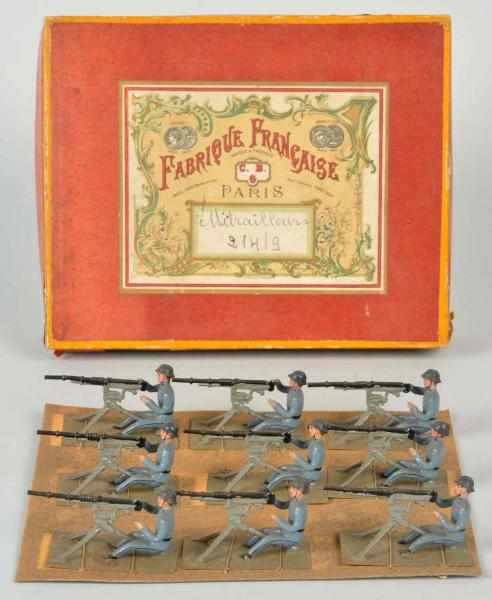 Appraisal: Set of French Military Machine Gun Figures Includes original box