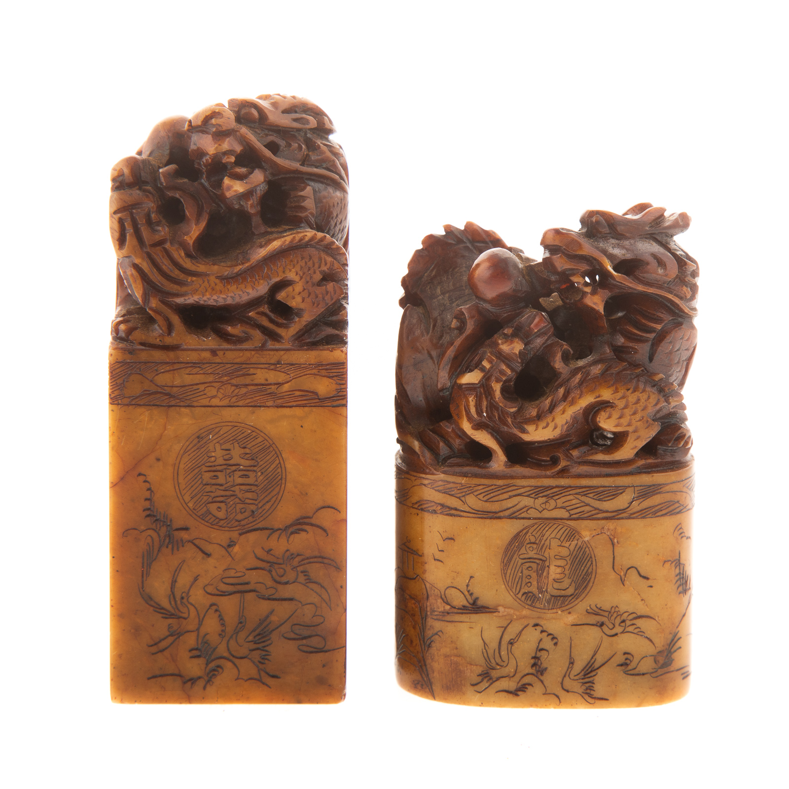 Appraisal: TWO CHINESE CARVED HARDSTONE CHOP SEALS Each topped with dragon