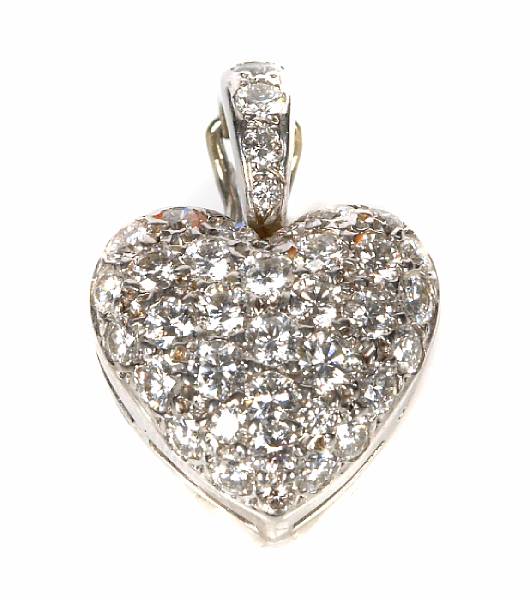 Appraisal: A diamond and k white gold heart pendant estimated total