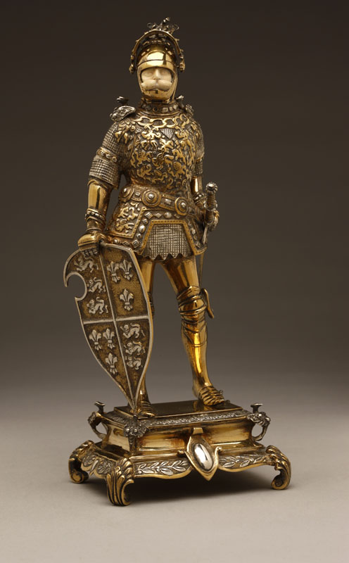 Appraisal: A German sterling vermeil and ivory figure of a medieval