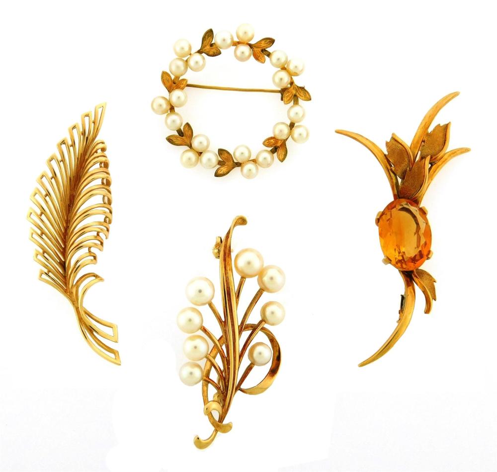 Appraisal: JEWELRY Four gold brooches details include open leaf design pin