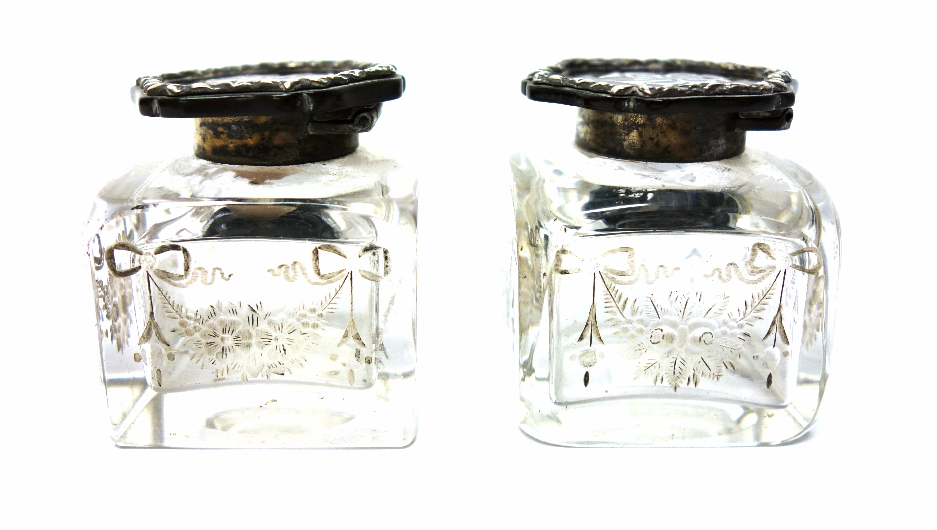 Appraisal: Two silver and tortoiseshell lidded square glass ink bottles etched