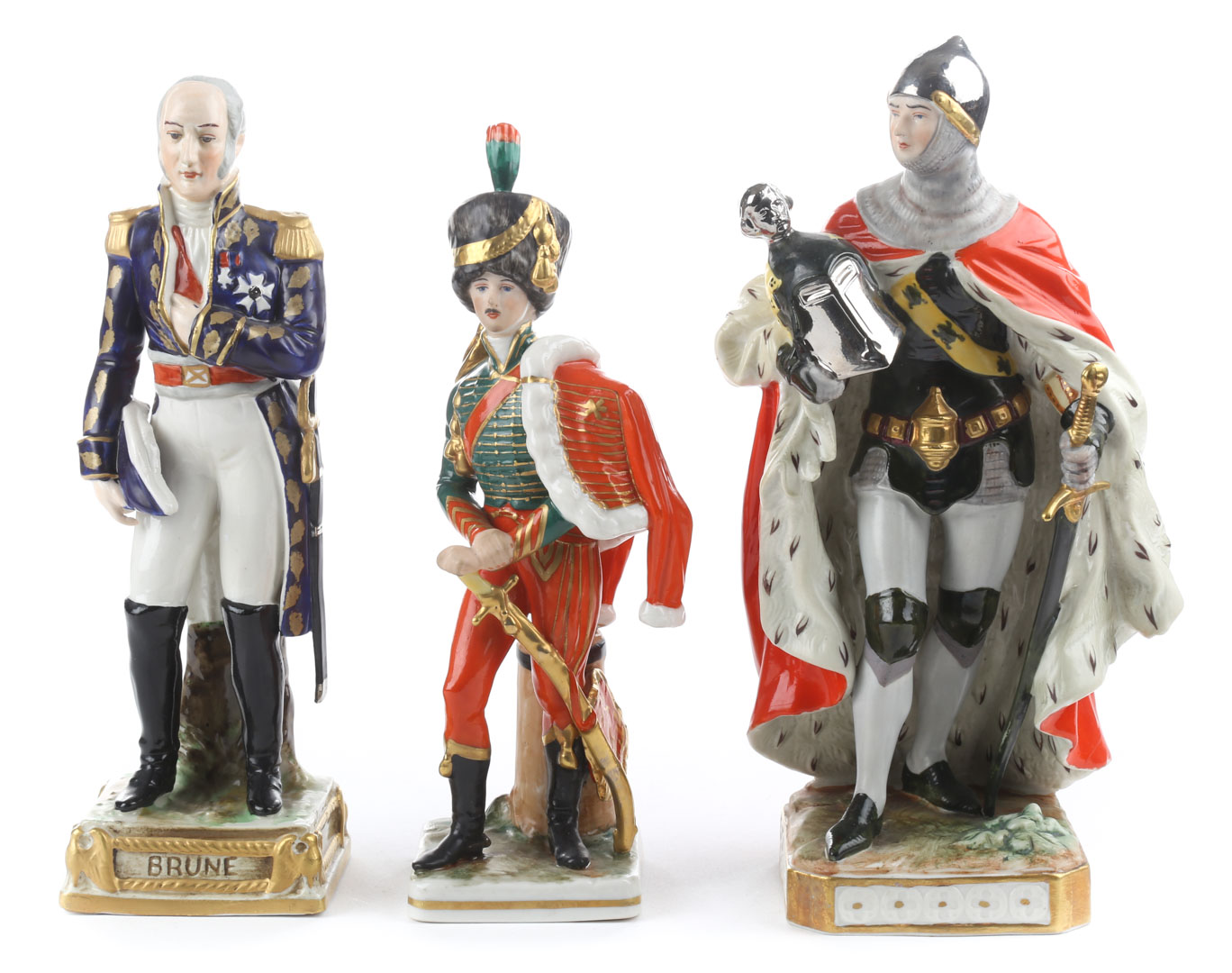 Appraisal: Three Continental porcelain soldiers including Nymphenburg Hussar French figure of