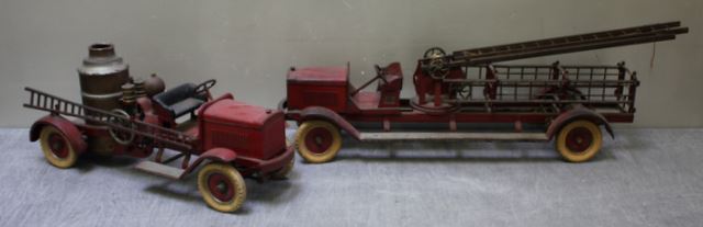 Appraisal: Kingsbury Steel Fire Trucks Includes a pumper and a ladder