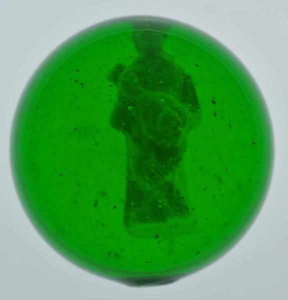 Appraisal: Green Glass Mandolin Player Sulphide Marble Description Figure of man