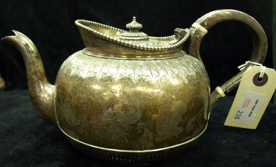 Appraisal: A teapot Sheffield of circular form with raised beaded rim