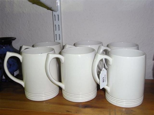 Appraisal: A SET OF SIX CREAMWARE TANKARDS by Keith Murray with